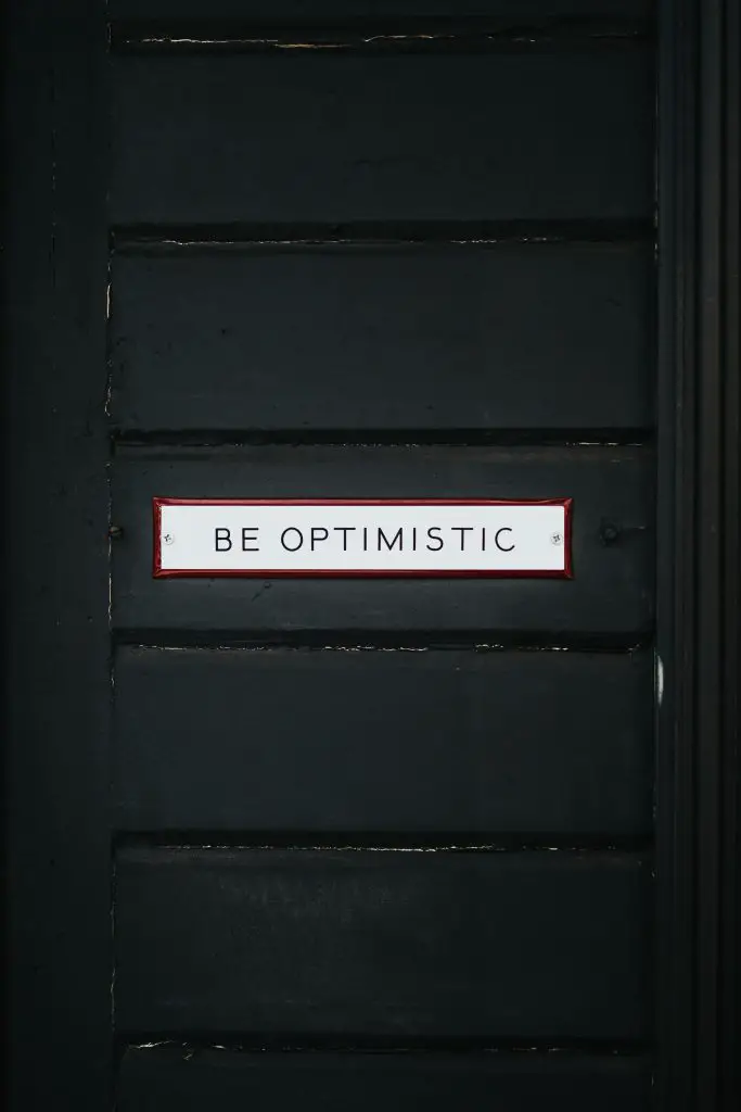 black door with be optimistic overlay