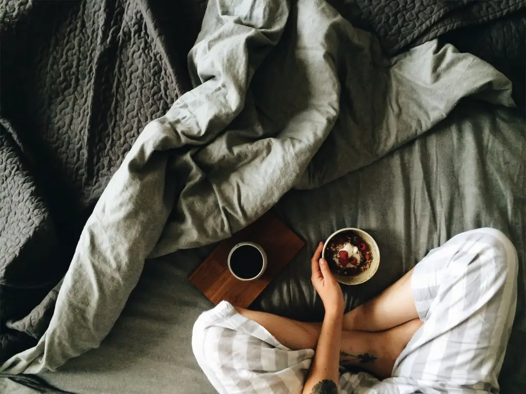 woman with breakfast in bed