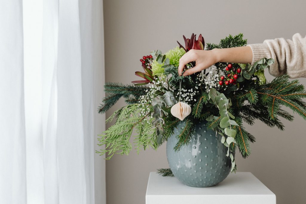 vase of flowers against neutral background