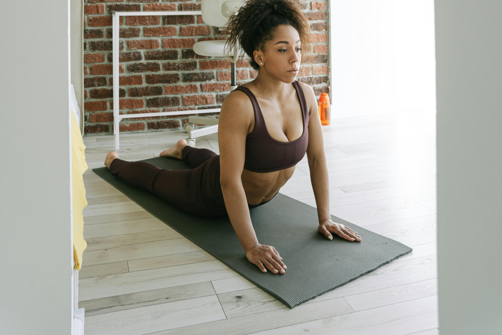 a-woman-streching-on-yoga-mat