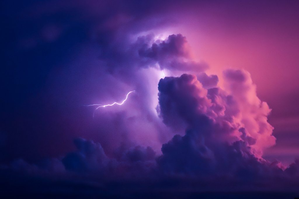 view of lightning in pink sky