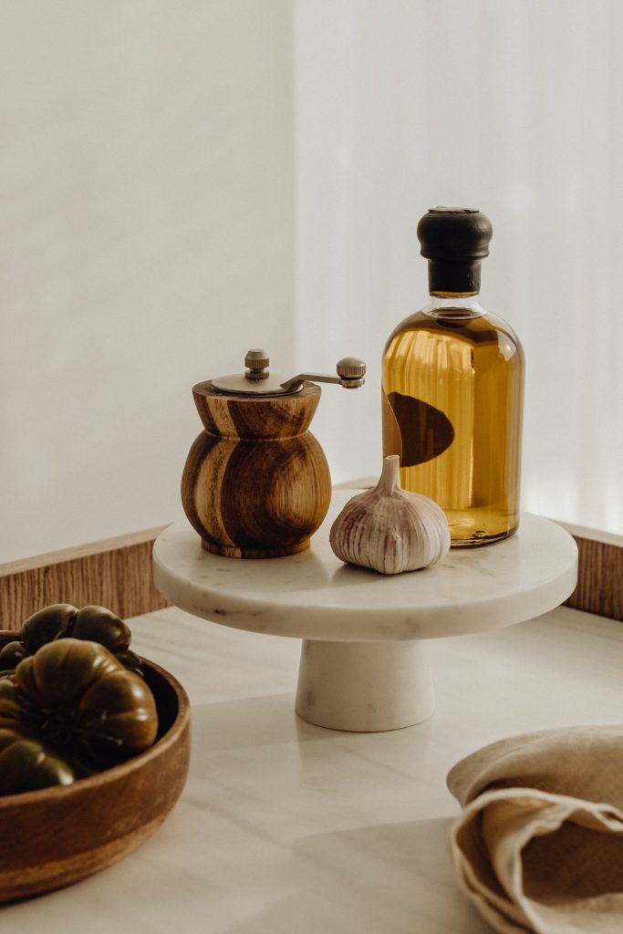 oil garlic and pepper shaker on stand