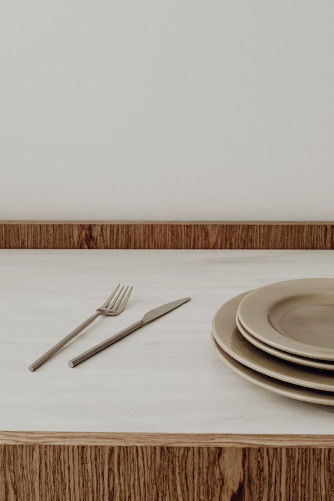 plates and fork on table