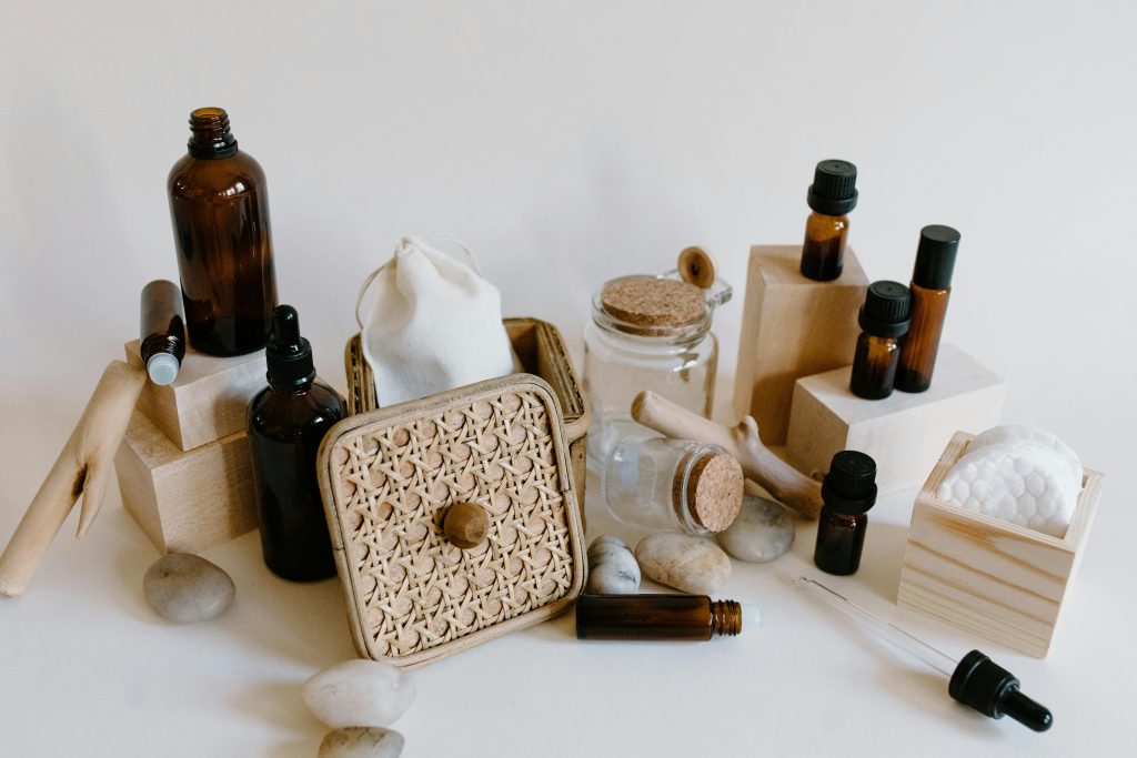 essential oil bottles in wooden baskets 