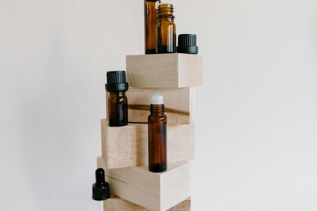 essential oil bottles on wood blocks