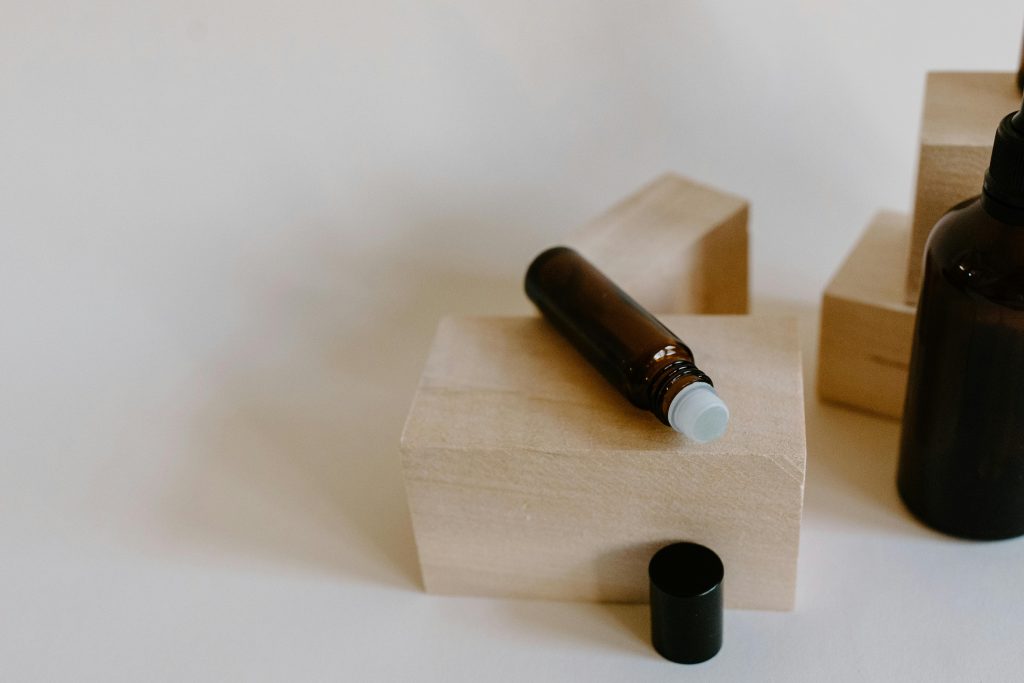 essential oil bottles on wood block