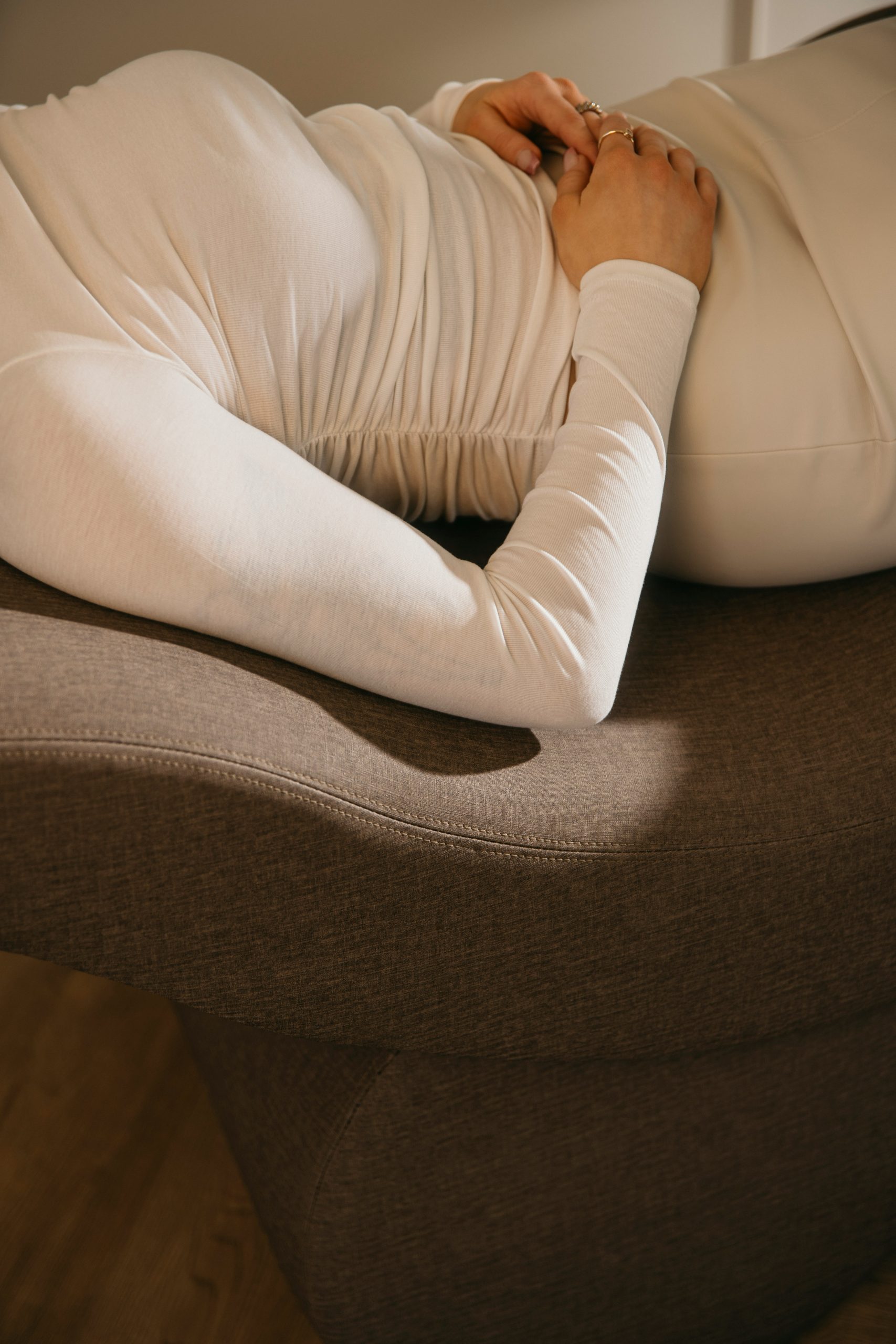 woman holding abdomen