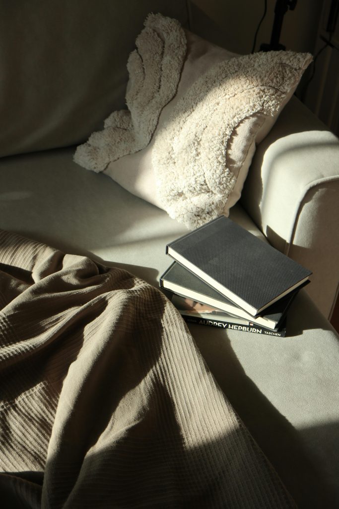 two notebook on couch