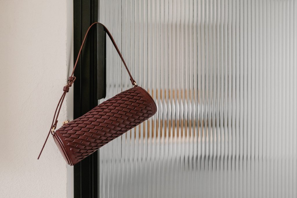 red bag hanging on black door frame