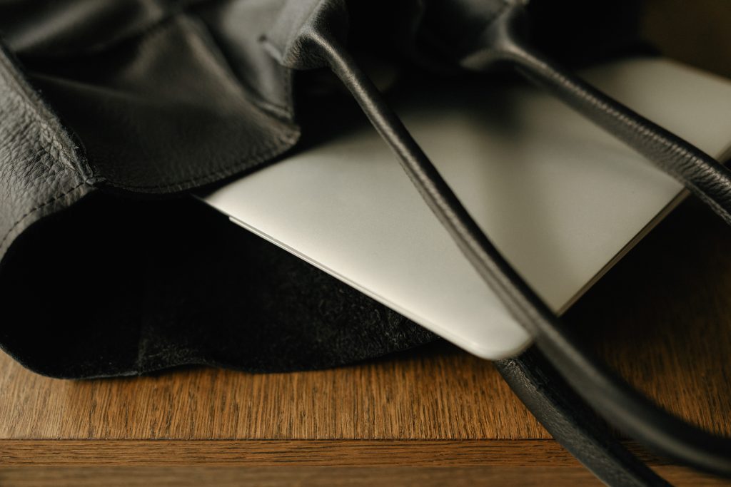 balck bag with grey laptop inside
