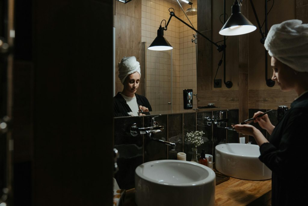woman in bathroom mirror