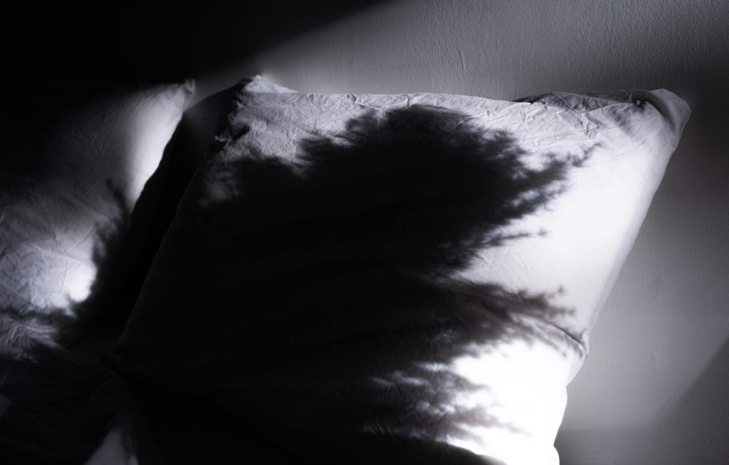 shadow om white pillow