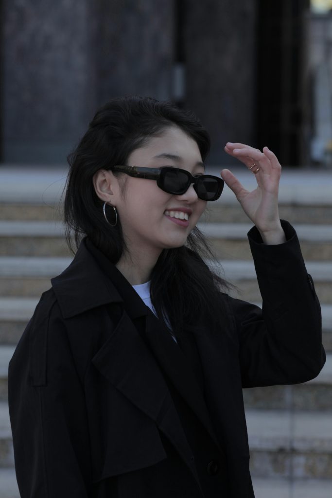 woman with sunglasses on smiling