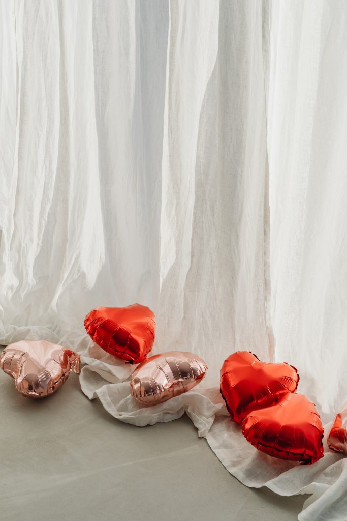 heart ballons in row on floor