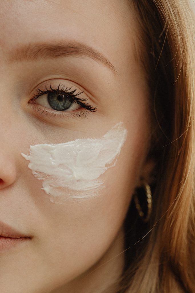 woman with cream on her face
