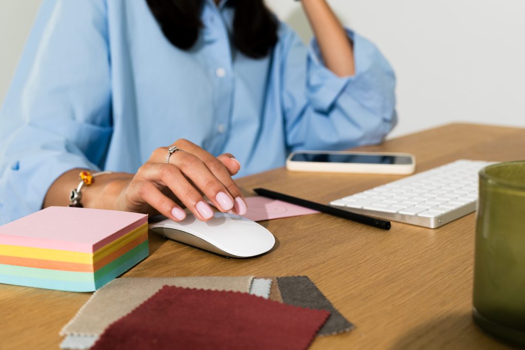 woman at desk working - How to Manage a Career with Chronic Illness